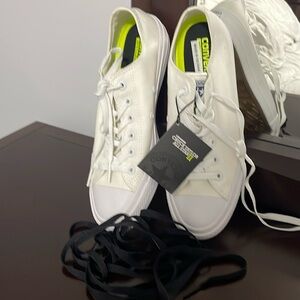 Converse low top sneakers.  Chuck Taylor All Star II.